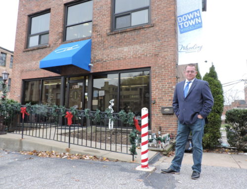 City funds latest of eight grants for improving downtown building facades